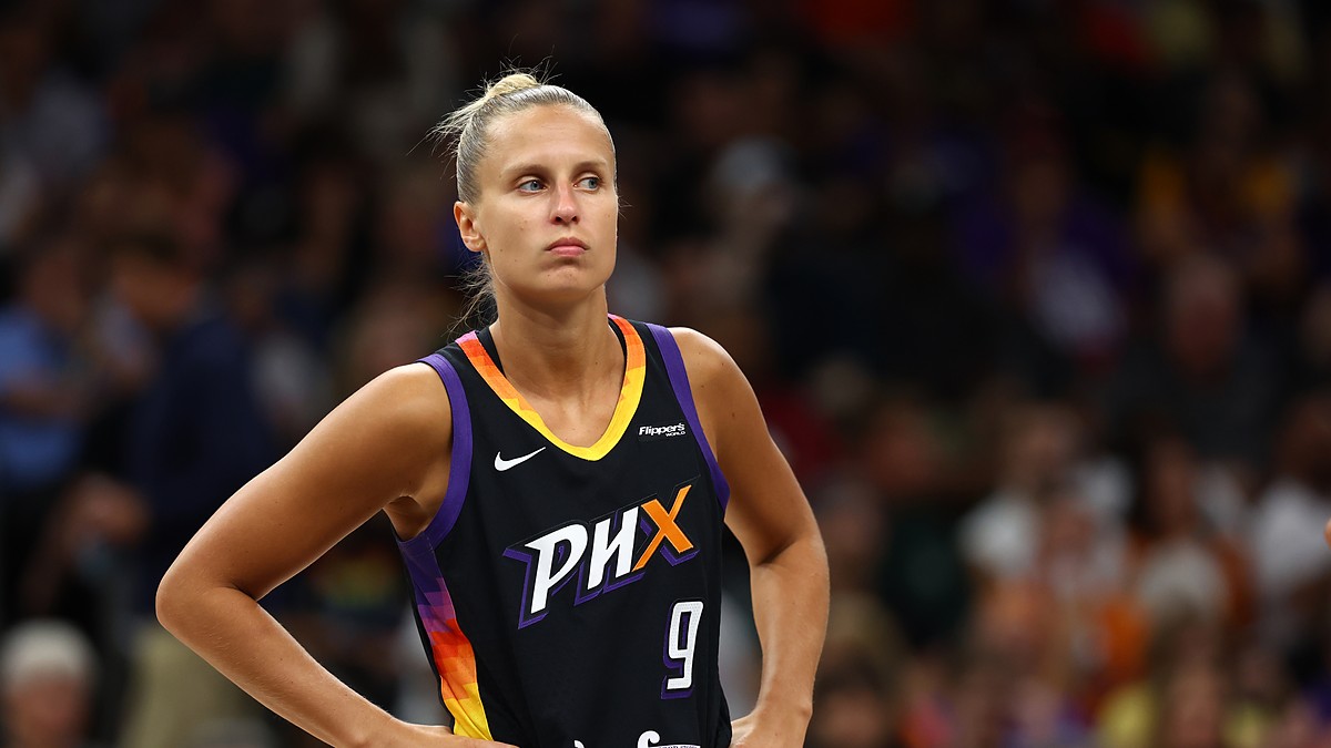 Phoenix Mercury guard Kitija Laksa stands with hands on hips during a game against the Sparks.