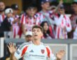 FC Dallas forward Logan Farrington raises both hands to the crowd after scoring against Guadalajara