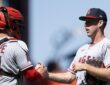 Los Angeles Angels catcher Logan O'Hoppe shakes hands with pitcher Mitch Farris after a win at Oracle Park.