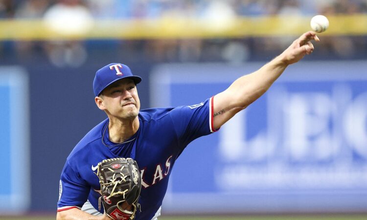 Texas Rangers left-handed pitcher Marco Gonzales releases a pitch against the Tampa Bay Rays at Tropicana Field.