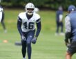 Dallas Cowboys tight end Michael Trigg comes out of his stance during a drill at rookie minicamp.