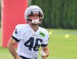 New England Patriots tight end Mitch Van Vooren jogs onto the field in a No. 46 practice jersey.