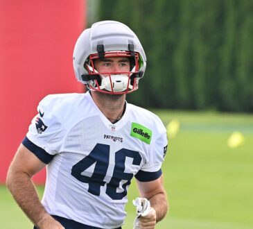 New England Patriots tight end Mitch Van Vooren jogs onto the field in a No. 46 practice jersey.