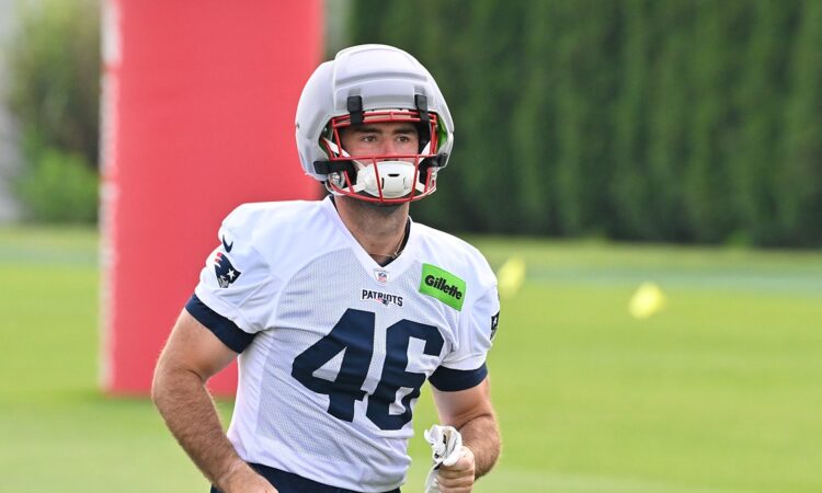 New England Patriots tight end Mitch Van Vooren jogs onto the field in a No. 46 practice jersey.