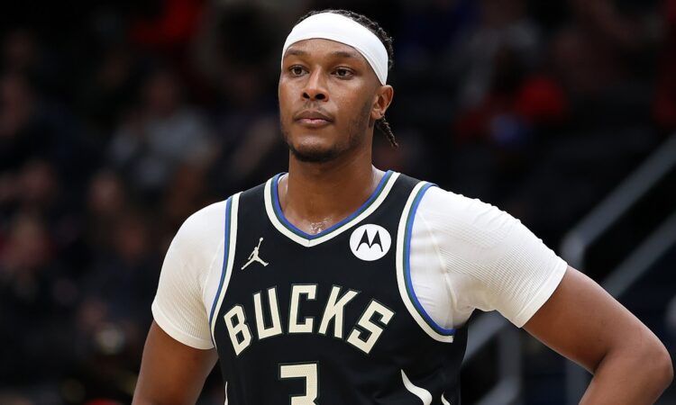 Milwaukee Bucks center Myles Turner stands with a hand on his hip during a stoppage at Capital One Arena.