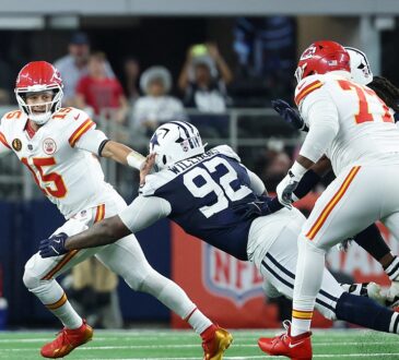Cowboys defensive tackle Quinnen Williams lunges at Chiefs quarterback Patrick Mahomes as he escapes the pocket
