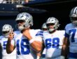 Dallas Cowboys quarterback Sam Howell walks out of the tunnel ahead of teammates before a game at Lumen Field.