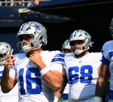 Dallas Cowboys quarterback Sam Howell walks out of the tunnel ahead of teammates before a game at Lumen Field.