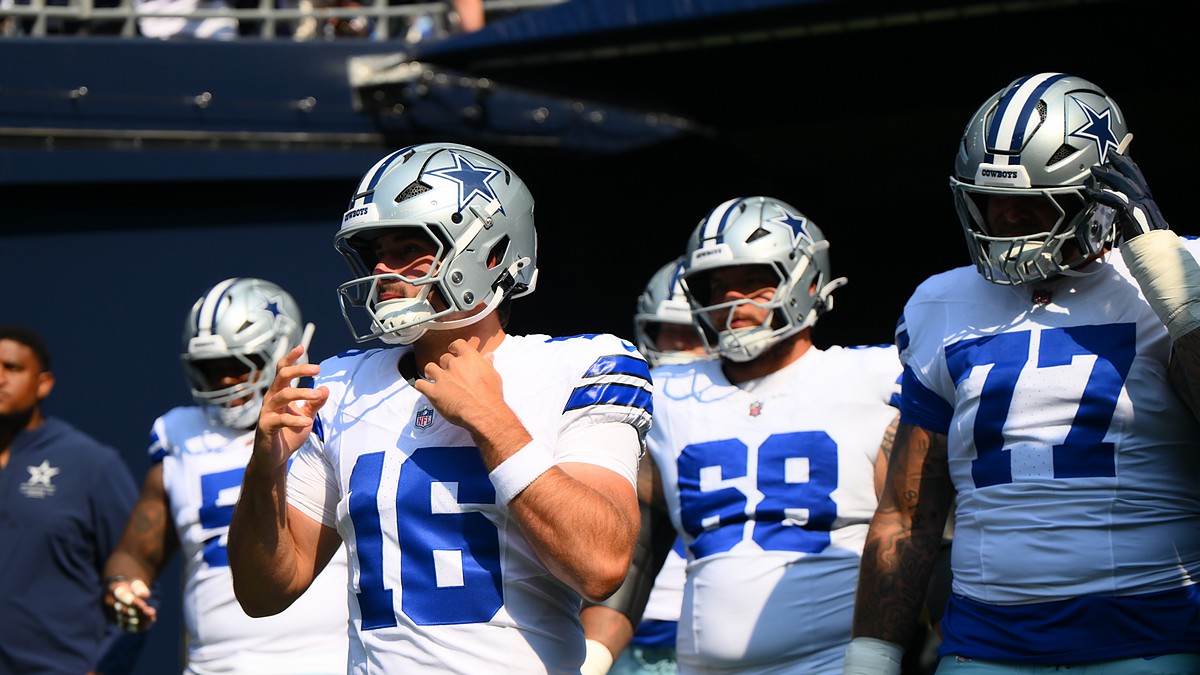 Dallas Cowboys quarterback Sam Howell walks out of the tunnel ahead of teammates before a game at Lumen Field.