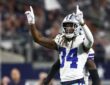 Dallas Cowboys cornerback Shavon Revel Jr. raises both index fingers to celebrate a play against the Minnesota Vikings.