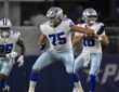 Dallas Cowboys offensive tackle Shiyazh Pete sets in pass protection with the quarterback dropping back behind him.