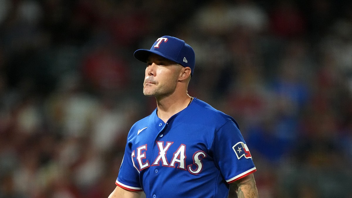 Rangers manager Skip Schumaker gestures on the field during a game against the Angels