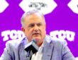 TCU head coach Sonny Dykes speaks into a microphone at a podium during Big 12 media days.