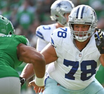 Dallas Cowboys offensive tackle Terence Steele sets to block Philadelphia Eagles linebacker Nolan Smith Jr. off the edge.