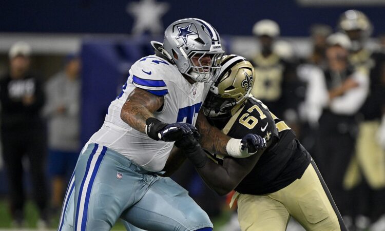 Dallas Cowboys guard Trevor Keegan locks up New Orleans Saints defensive tackle Kahlil Saunders at the line.