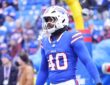 Buffalo Bills linebacker Von Miller stands in his blue No. 40 jersey during warmups before a playoff game.