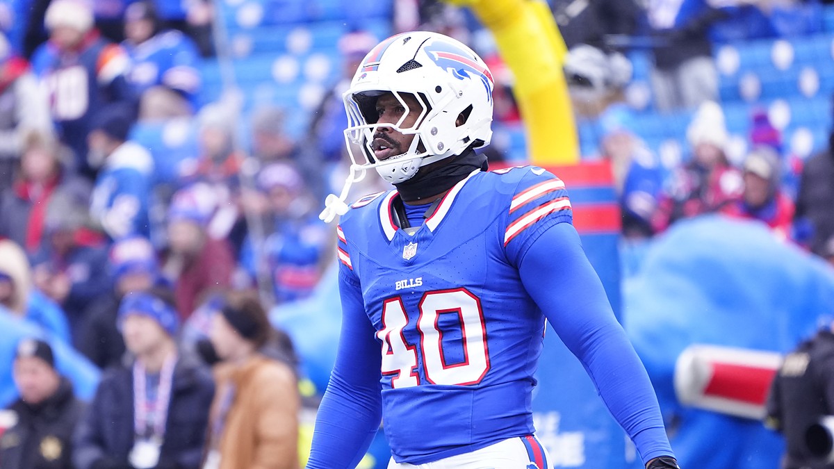 Buffalo Bills linebacker Von Miller stands in his blue No. 40 jersey during warmups before a playoff game.