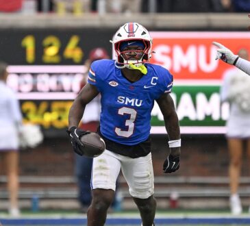 SMU Mustangs safety Ahmaad Moses, No. 3, carries the ball upfield after an interception.