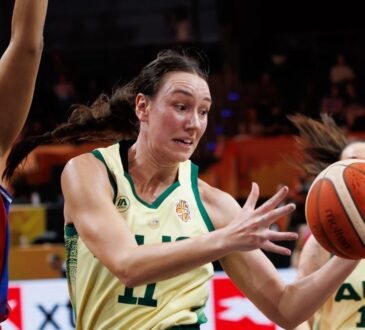 Australia forward Alanna Smith reaches for a loose ball past a Puerto Rico defender in a World Cup group game.