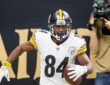 Pittsburgh Steelers wide receiver Antonio Brown carries the ball into the end zone against the Saints.