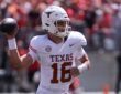 Texas Longhorns quarterback Arch Manning drops back with the ball cocked to throw against Ohio State.