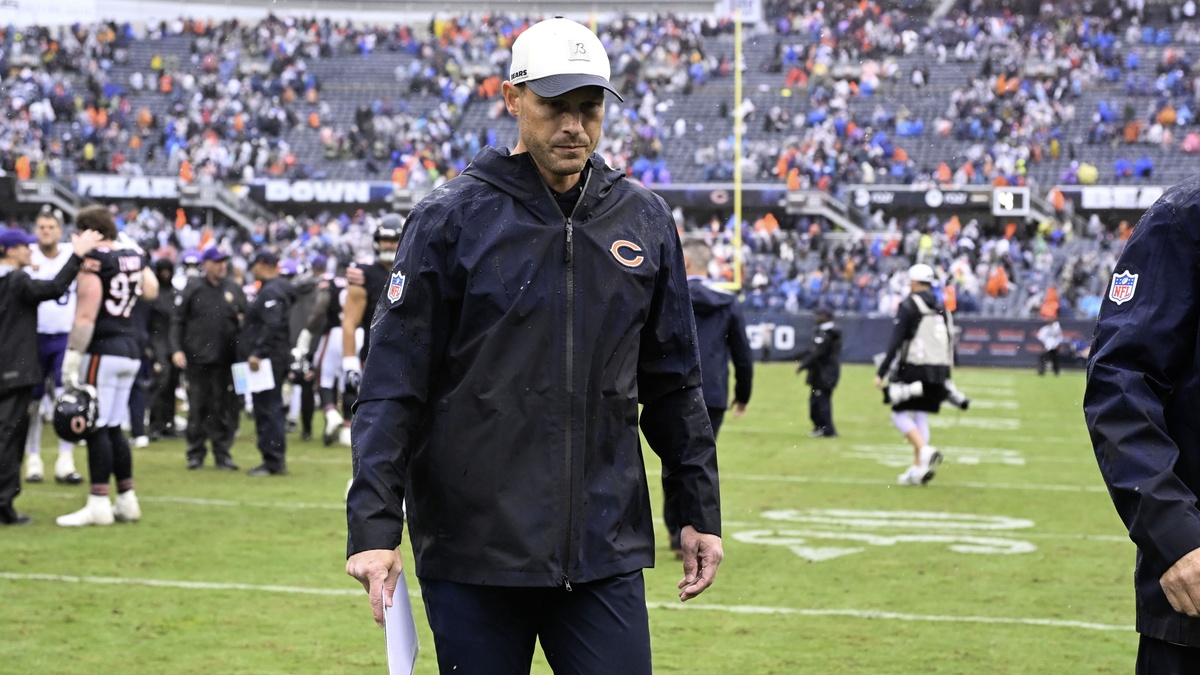 Chicago Bears head coach Ben Johnson walks off the field after a game against the Minnesota Vikings at Soldier Field.