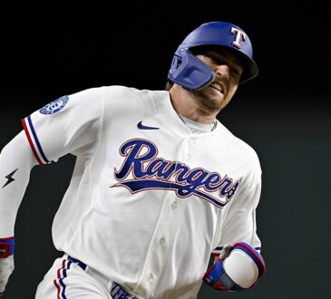Rangers center fielder Brandon Nimmo runs the bases with his jaw clenched during the seventh inning.