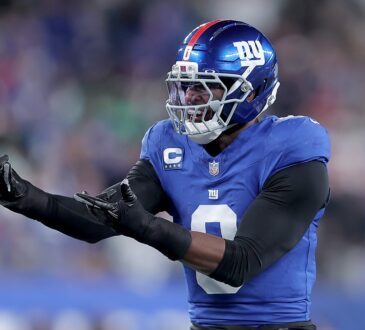 New York Giants linebacker Brian Burns gestures in celebration after recording a sack against Philadelphia.