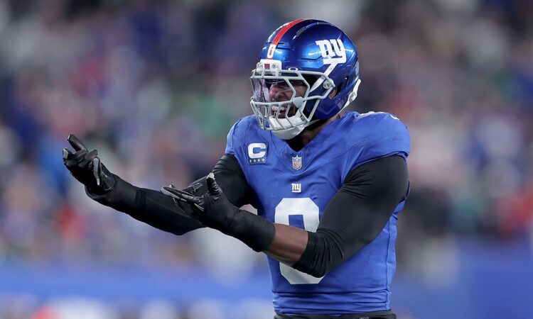 New York Giants linebacker Brian Burns gestures in celebration after recording a sack against Philadelphia.