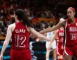 United States guard Caitlin Clark slaps hands with teammate Angel Reese during a game at the FIBA Women's World Cup.