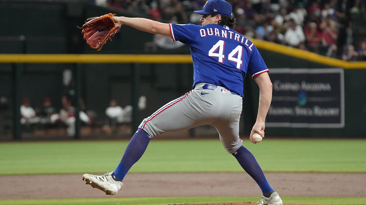 Texas Rangers pitcher Cal Quantrill strides toward the plate mid-delivery against Arizona at Chase Field.