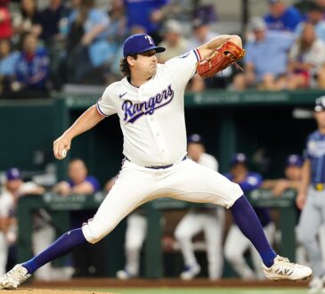 Texas Rangers right-hander Cal Quantrill, No. 44, strides toward the plate mid-delivery at Globe Life Field.