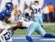 Two Dallas Cowboys defenders wrap up New York Giants wide receiver Malik Nabers after a catch.