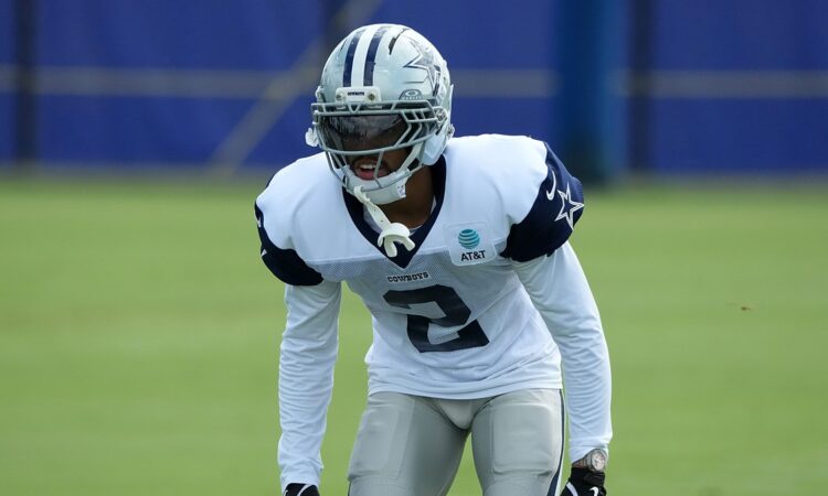 Dallas Cowboys cornerback Cobie Durant crouches in a backpedal stance during a joint practice with the Rams.