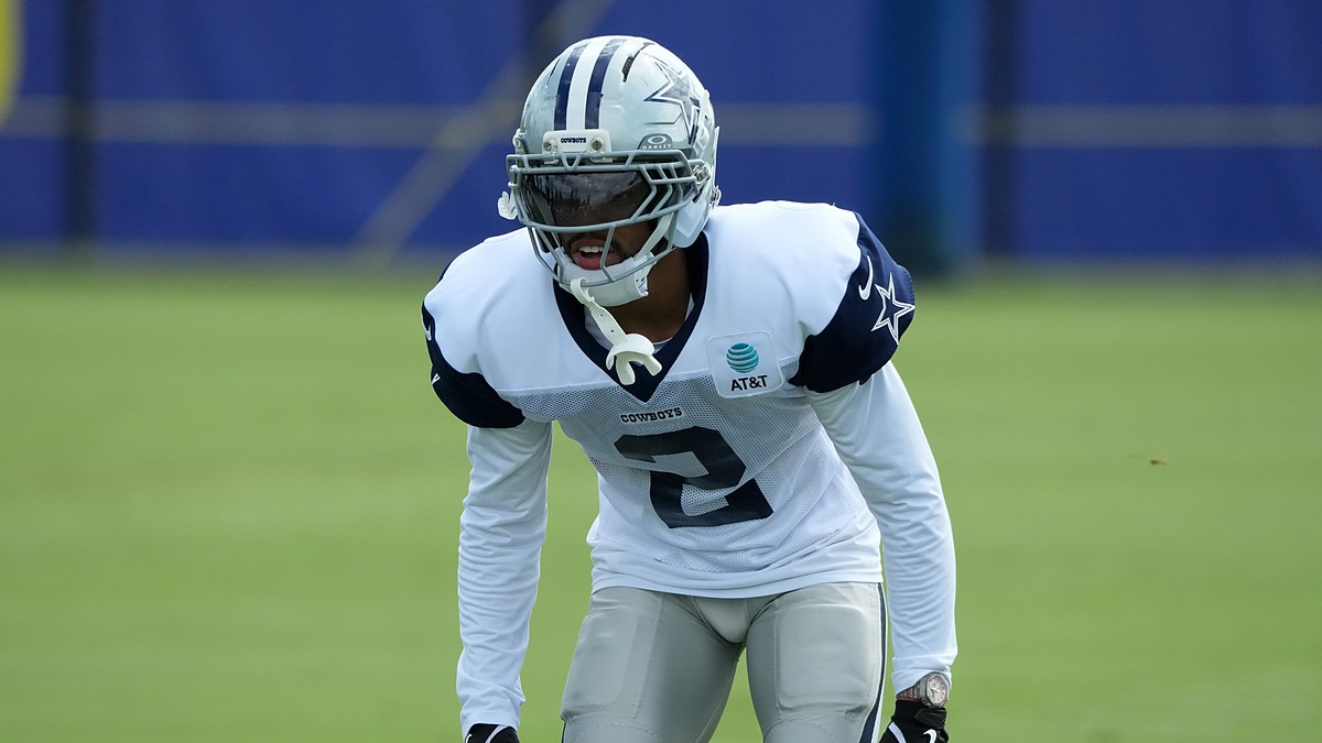 Dallas Cowboys cornerback Cobie Durant crouches in a backpedal stance during a joint practice with the Rams.