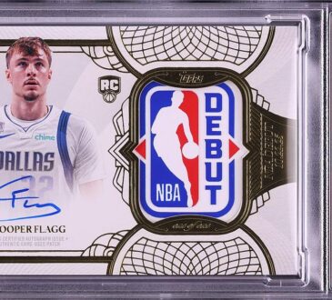 A graded Cooper Flagg rookie card with his autograph and an NBA Debut logo patch in a PSA slab.