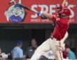 Texas Rangers shortstop Corey Seager follows through on a swing during a game against Toronto at Globe Life Field.