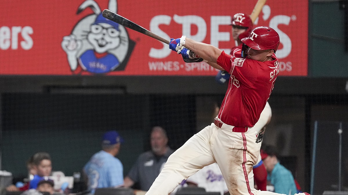 Texas Rangers shortstop Corey Seager follows through on a swing during a game against Toronto at Globe Life Field.
