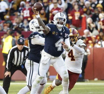Dallas Cowboys quarterback Dak Prescott throws downfield as Washington Commanders linebacker Frankie Luvu closes in.