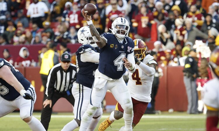 Dallas Cowboys quarterback Dak Prescott throws downfield as Washington Commanders linebacker Frankie Luvu closes in.