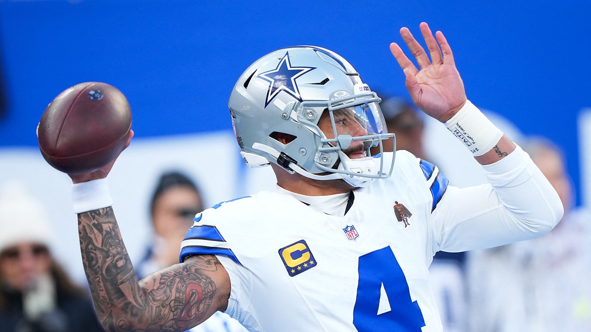 Dallas Cowboys quarterback Dak Prescott throws during warmups before a game at MetLife Stadium.