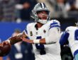Dallas Cowboys quarterback Dak Prescott cocks the ball to throw during a game against the New York Giants.