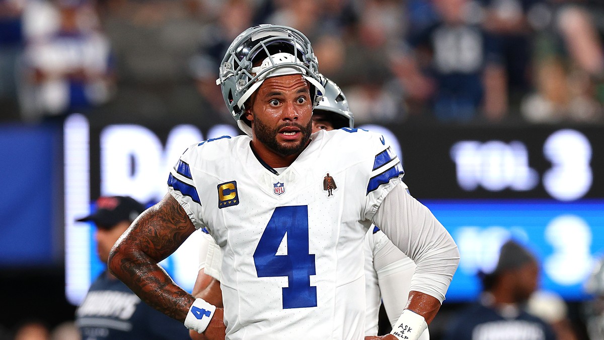 Dallas Cowboys quarterback Dak Prescott stands with his hands on his hips during warmups before facing the Giants.