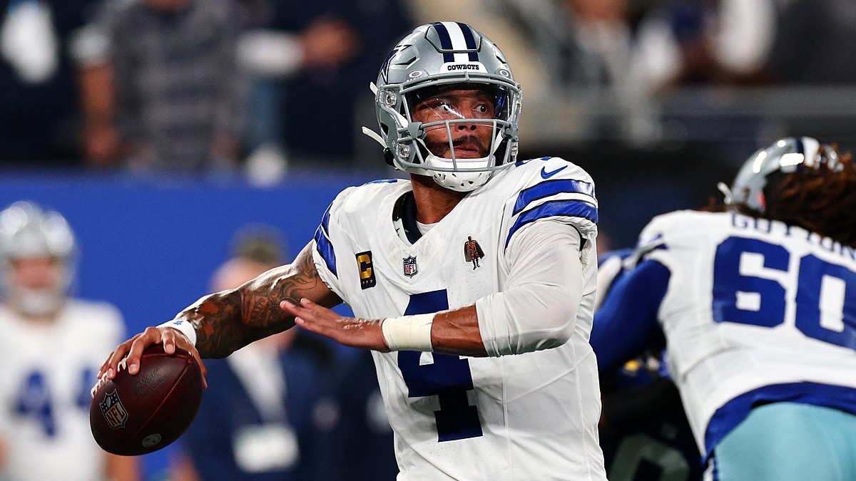 Dallas Cowboys quarterback Dak Prescott cocks the ball to throw during a game against the New York Giants.