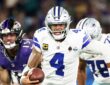 Dallas Cowboys quarterback Dak Prescott runs with the ball as Baltimore Ravens linebacker Michael Green chases him.