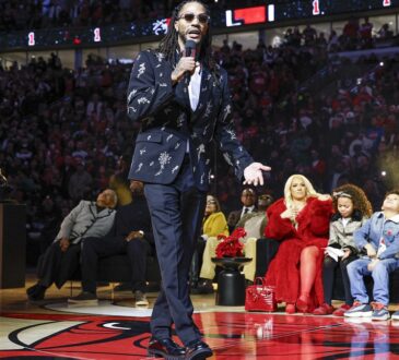 Former Chicago Bulls point guard Derrick Rose speaks during his jersey retirement ceremony at United Center following a game against the Boston Celtics.