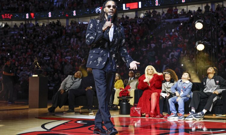 Former Chicago Bulls point guard Derrick Rose speaks during his jersey retirement ceremony at United Center following a game against the Boston Celtics.