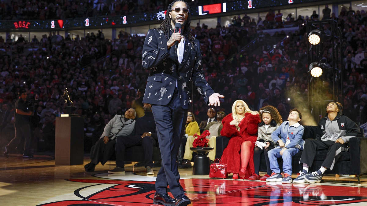 Former Chicago Bulls point guard Derrick Rose speaks during his jersey retirement ceremony at United Center following a game against the Boston Celtics.