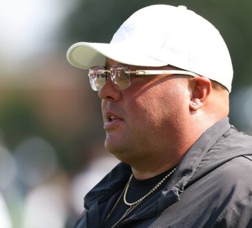 Philadelphia Eagles chief security officer Dom DiSandro watches practice during training camp.