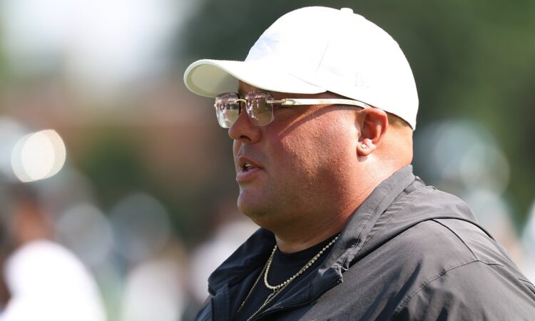 Philadelphia Eagles chief security officer Dom DiSandro watches practice during training camp.